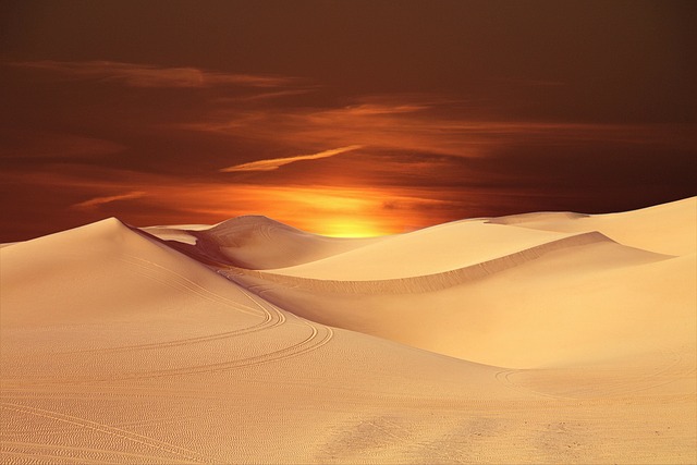 Desert dunes at sunset